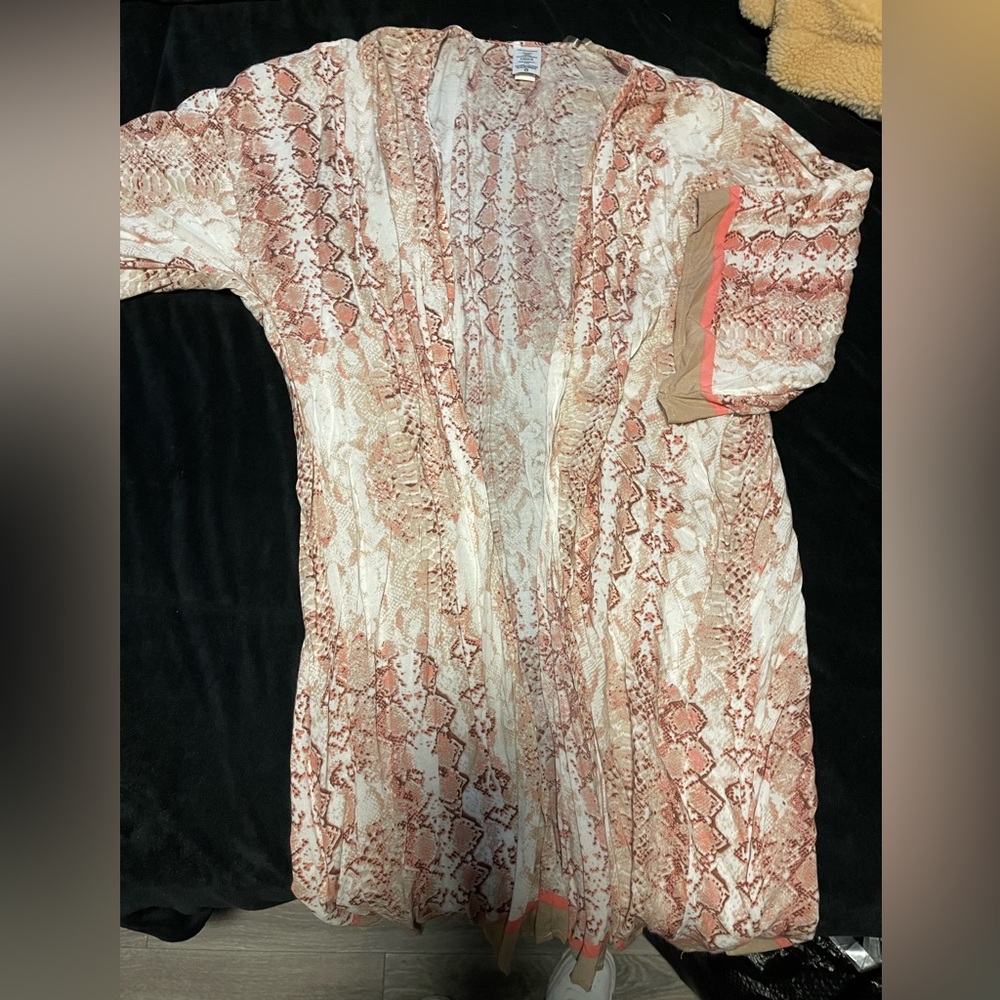 A light weight kimono. For like a cute crop top, or even over a bathing suit